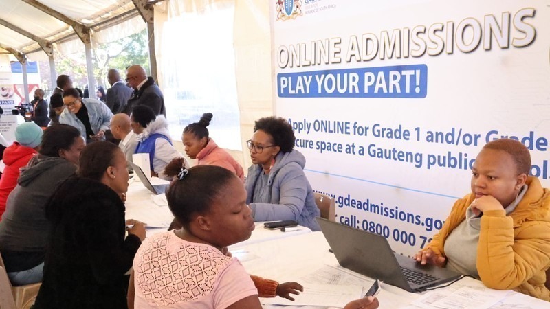 Gauteng-Department-of-Education-officials-assist-parents-with-online-admissions-for-Grade-1-and-8-for-the-2024-academic-year-Picture-Supplied-GDE