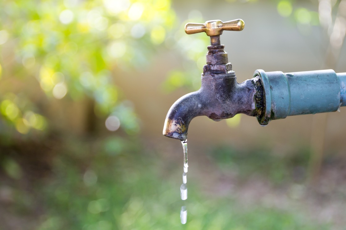 Water crisis: Calls for Mayor Morero to resign intensify Brass water tap in nature background.