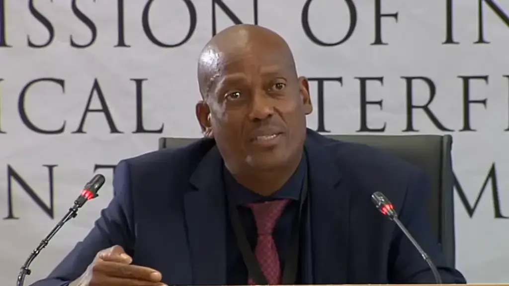
Forensic official accused of aiding murder
